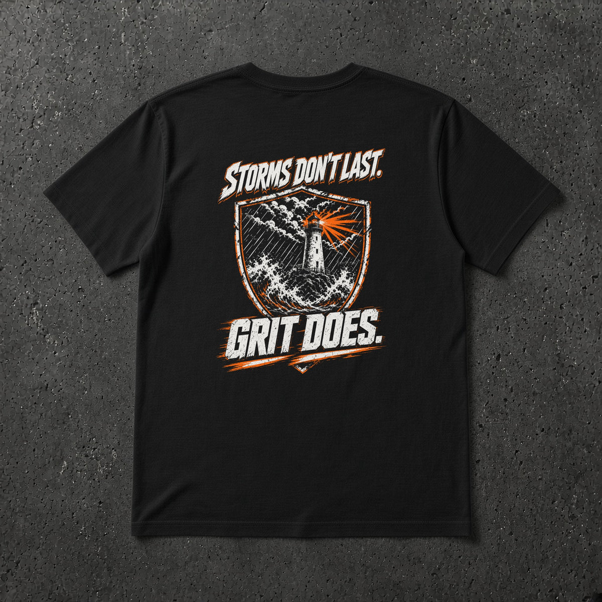 Black t-shirt with distressed white and safety orange lighthouse shield 'Storms Don't Last. Grit Does.' back print – Stay Positive by The Hillbillies, back view