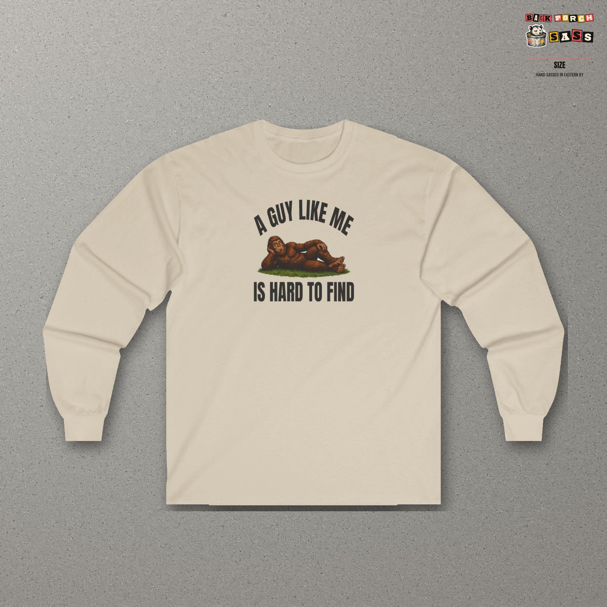 A Guy Like Me Is Hard to Find Bigfoot Long Sleeve Tee – Sand – front