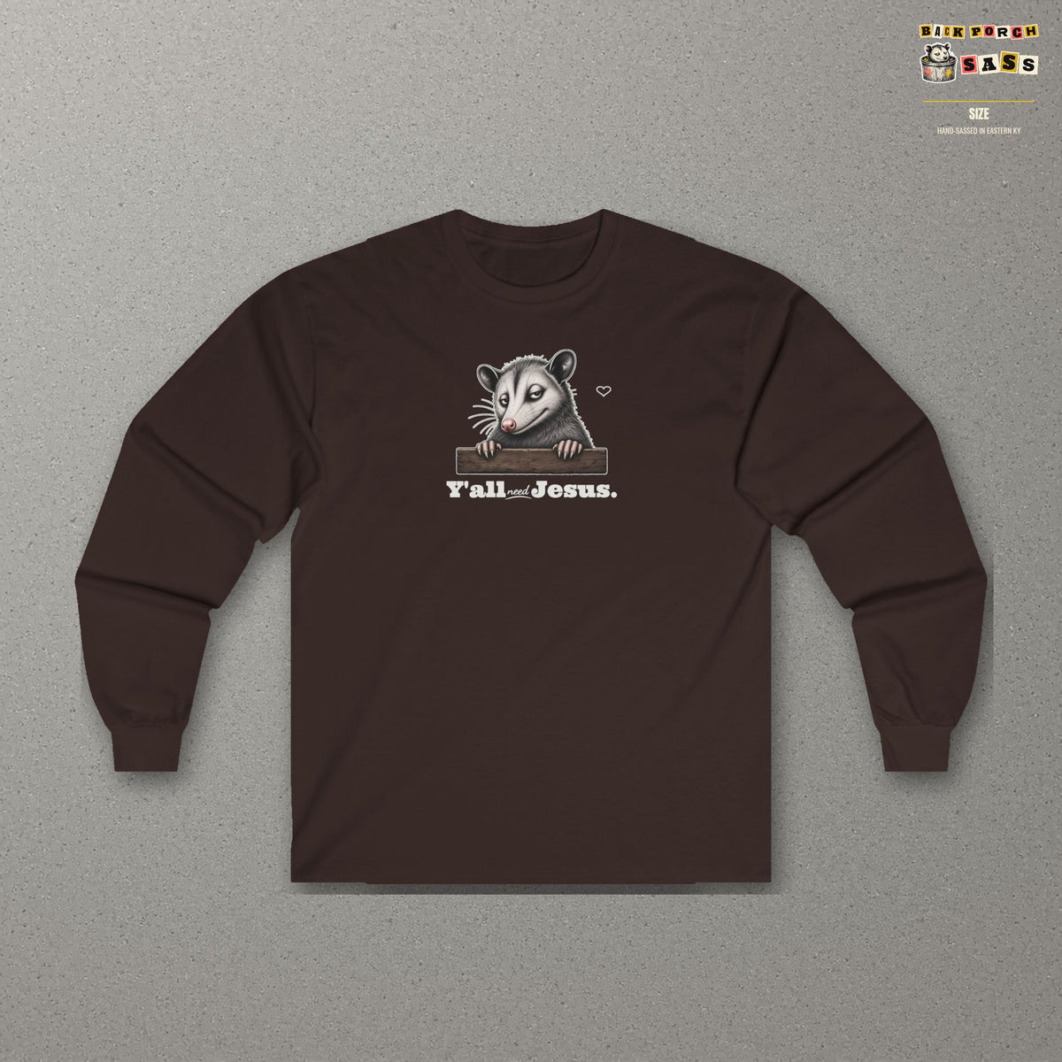 Y'all Need Jesus Side-Eye Possum Long Sleeve Tee – Dark Chocolate – front