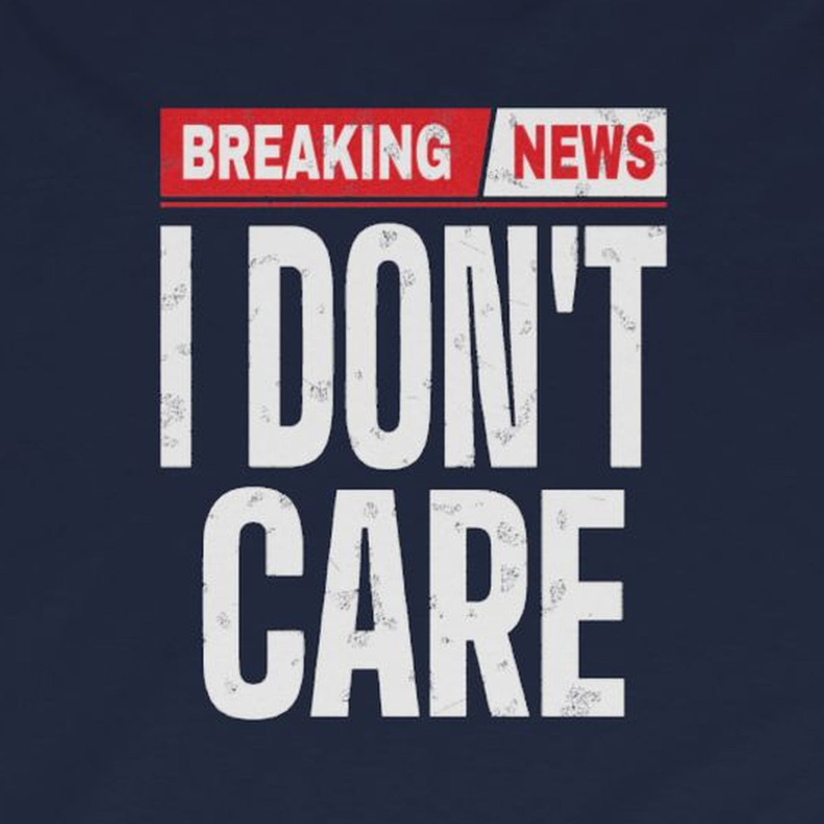 Breaking News I Don't Care Long Sleeve Tee – Navy – front print close-up