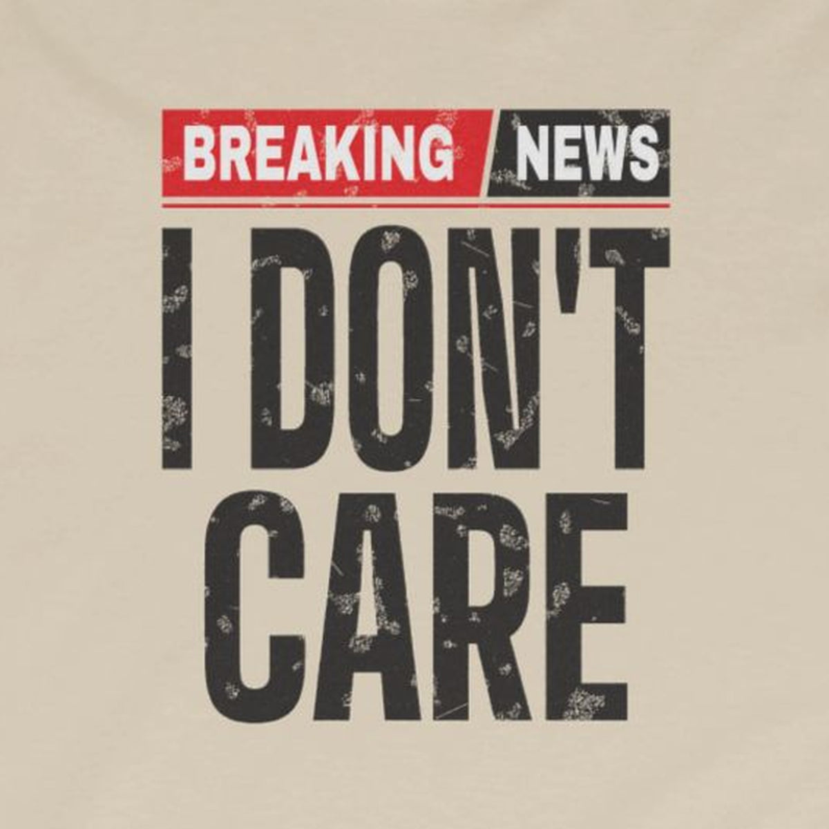 Breaking News I Don't Care Long Sleeve Tee – Sand – front print close-up