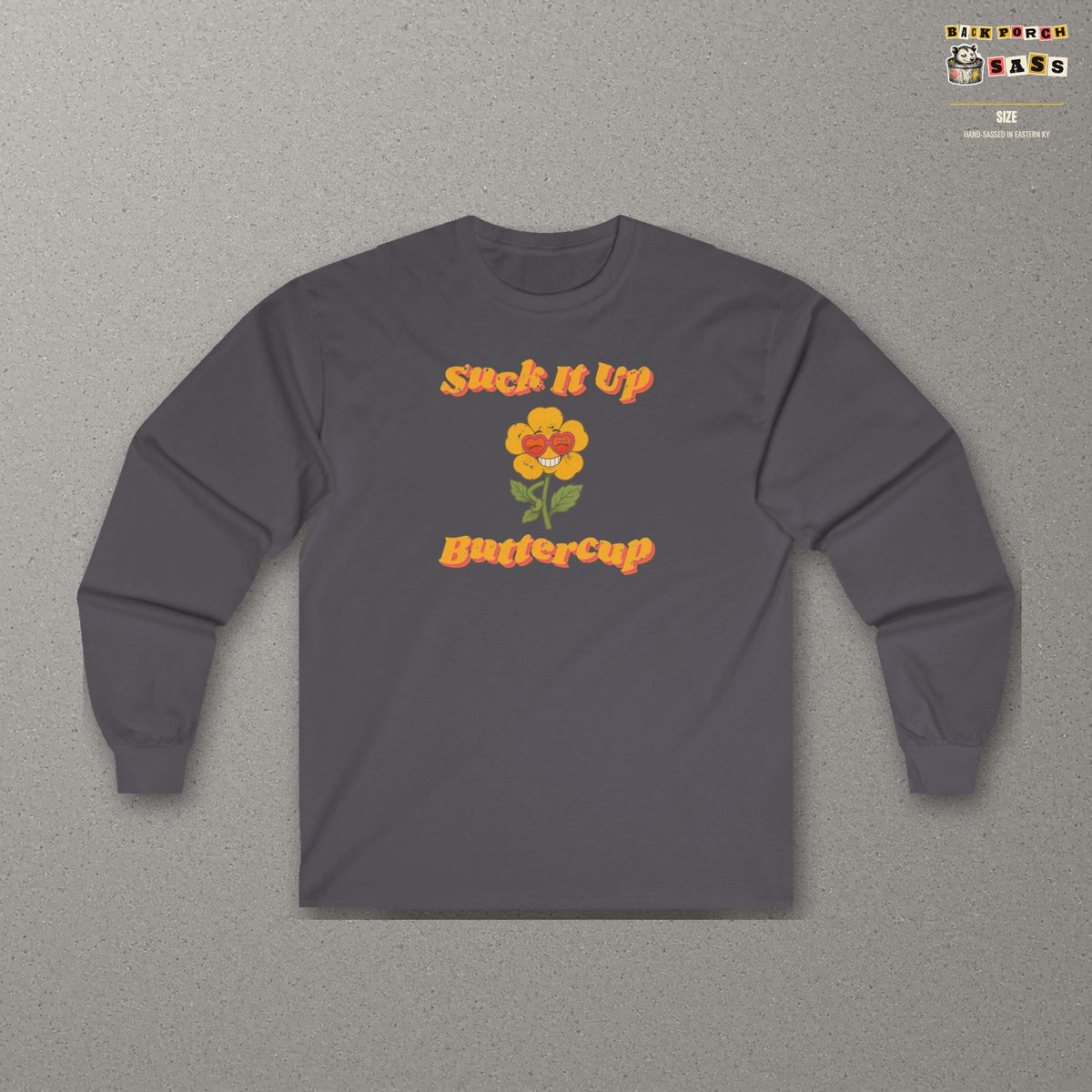 Suck It Up Buttercup Retro Groovy Long Sleeve Tee – Back Porch Sass – Charcoal – front