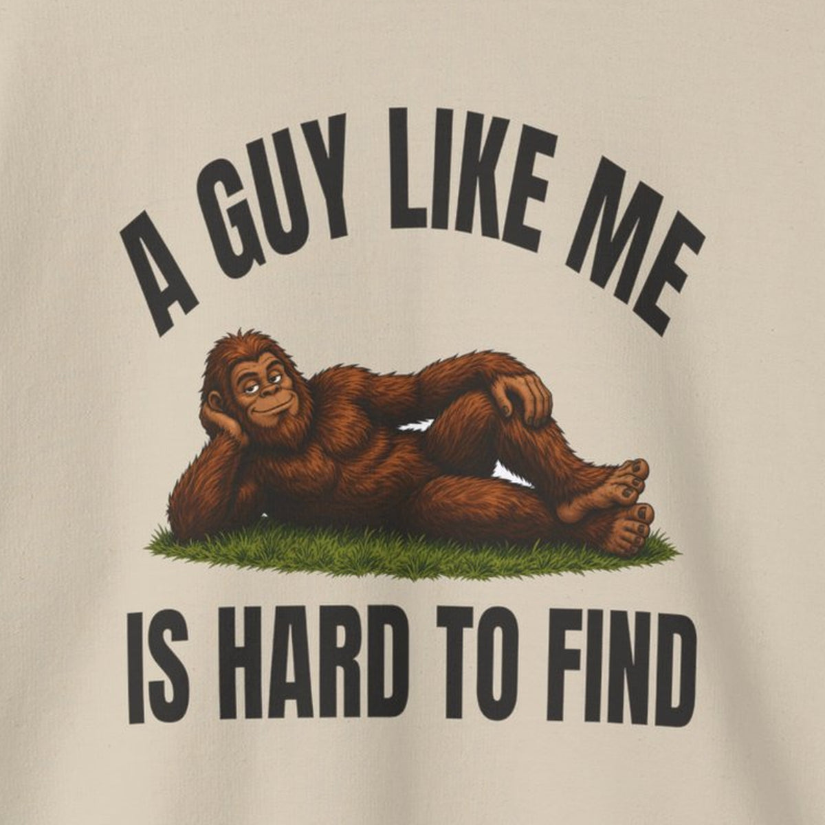 A Guy Like Me Is Hard to Find Bigfoot Sweatshirt – Sand – front print close-up