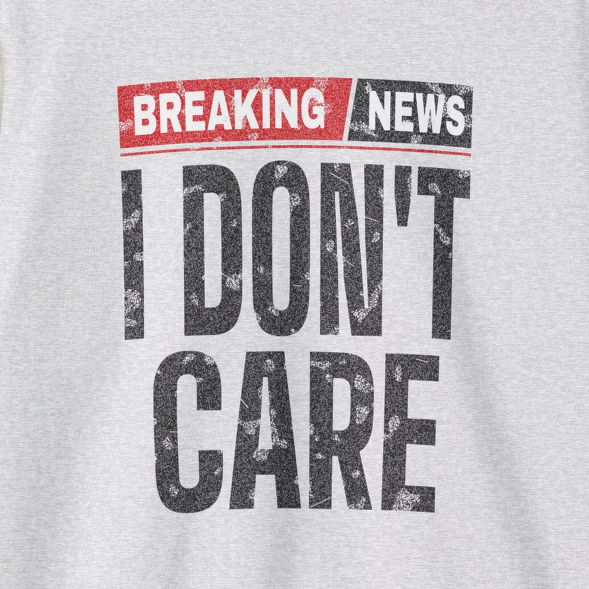 Breaking News I Don't Care Sweatshirt – Ash – front print close-up