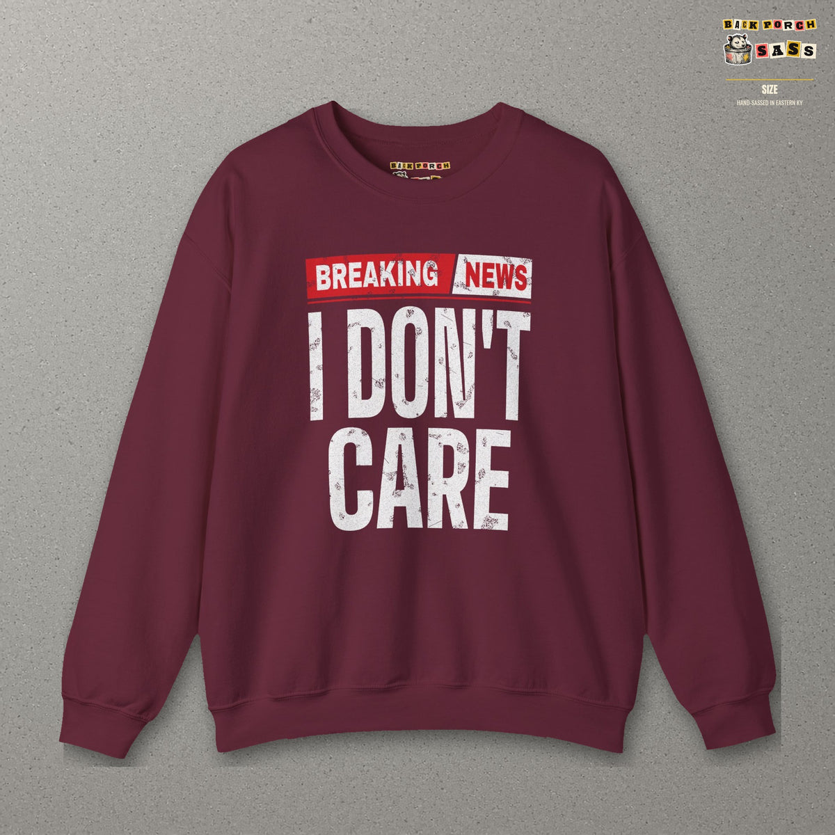 Breaking News I Don't Care Sweatshirt – Maroon – front