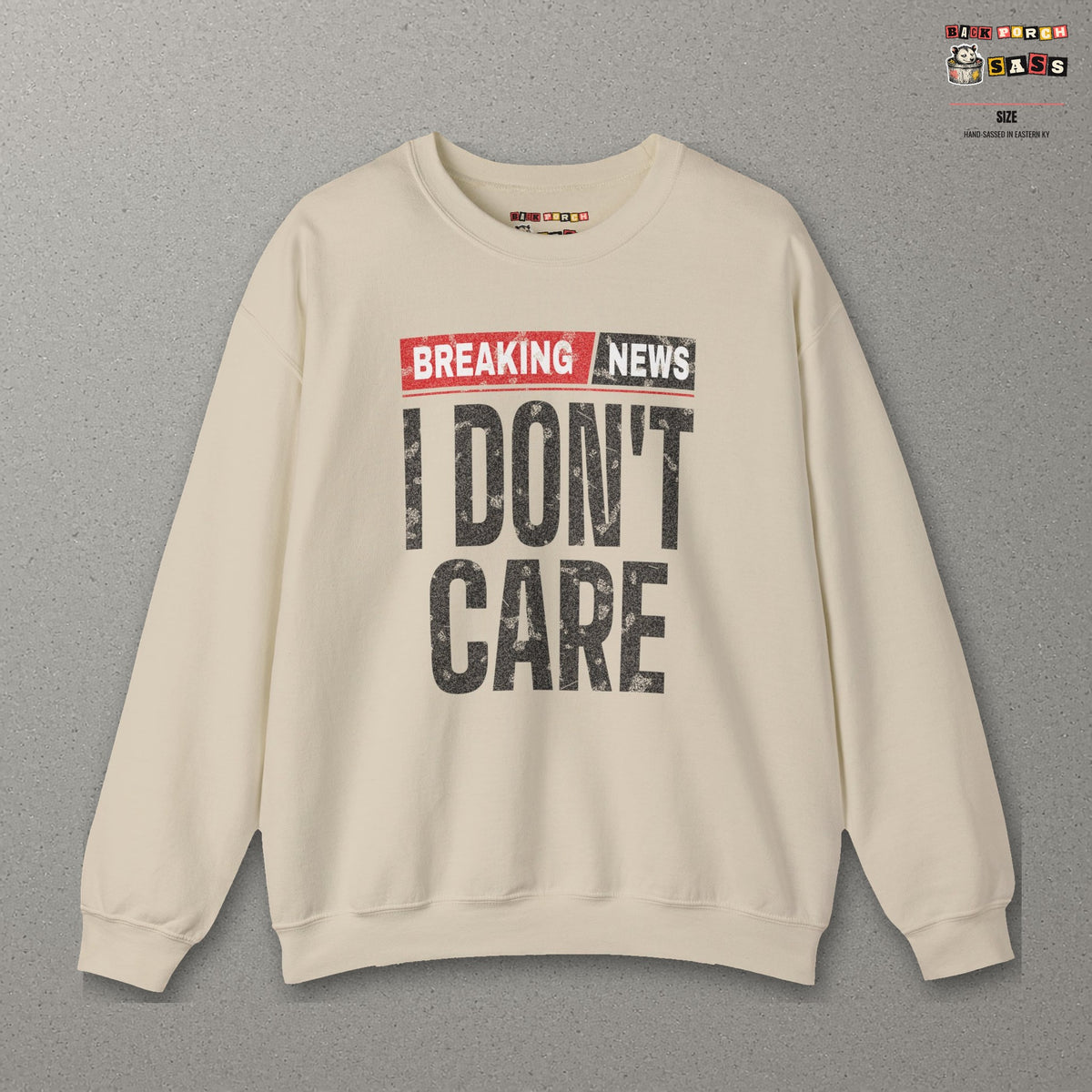Breaking News I Don't Care Sweatshirt – Sand – front