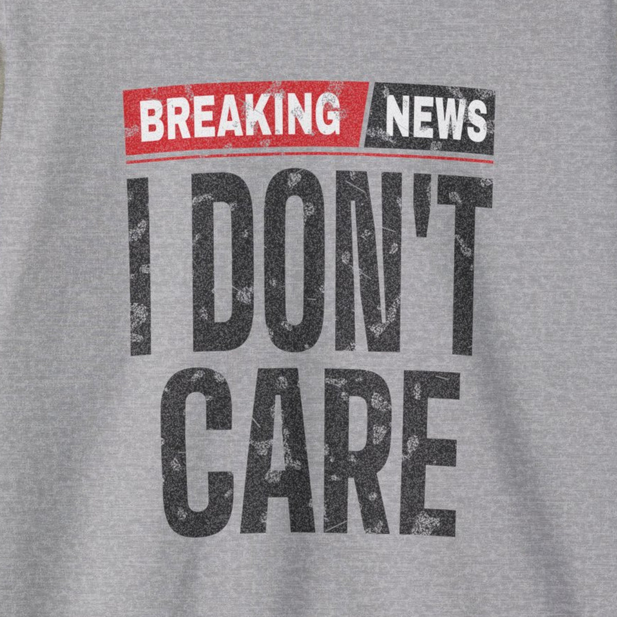 Breaking News I Don't Care Sweatshirt – Sport Grey – front print close-up