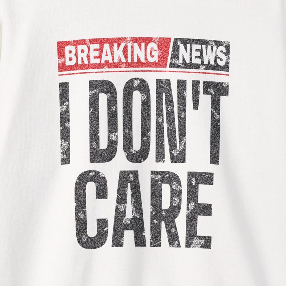 Breaking News I Don't Care Sweatshirt – White – front print close-up