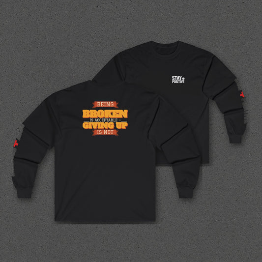 Being Broken Is Acceptable, Giving Up Is Not Long Sleeve Tee – Stay Positive – Black – two-shirt back print in front, other side offset behind