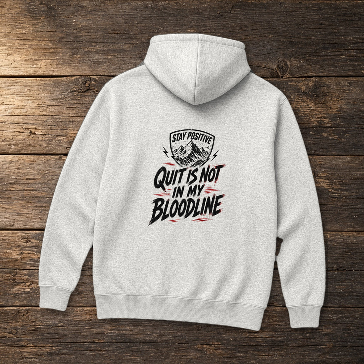 Quit Is Not in My Bloodline Hoodie in Ash, flat lay – Stay Positive