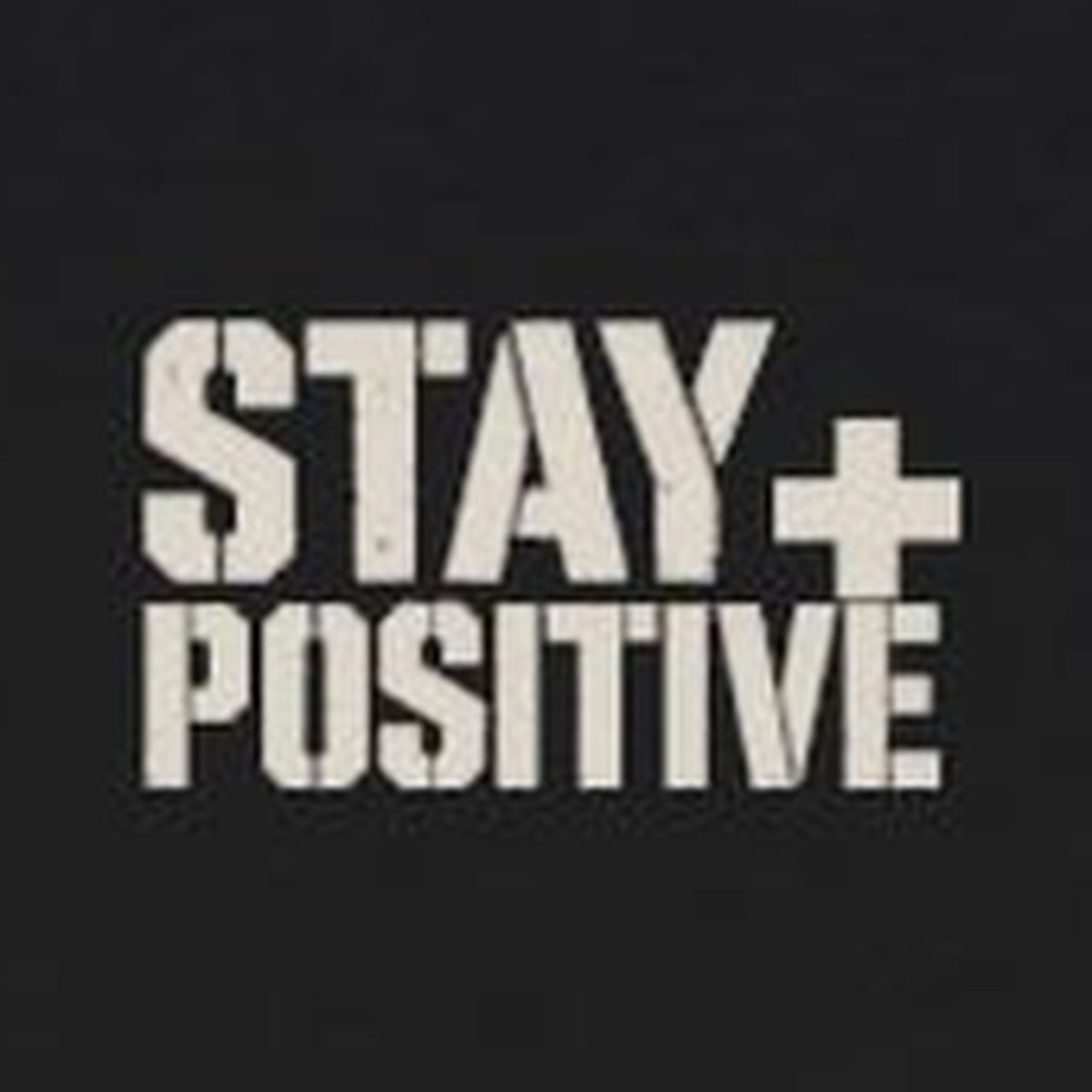 Comfort Never Built Nothin' Long Sleeve Tee – Stay Positive – Black – front print close-up