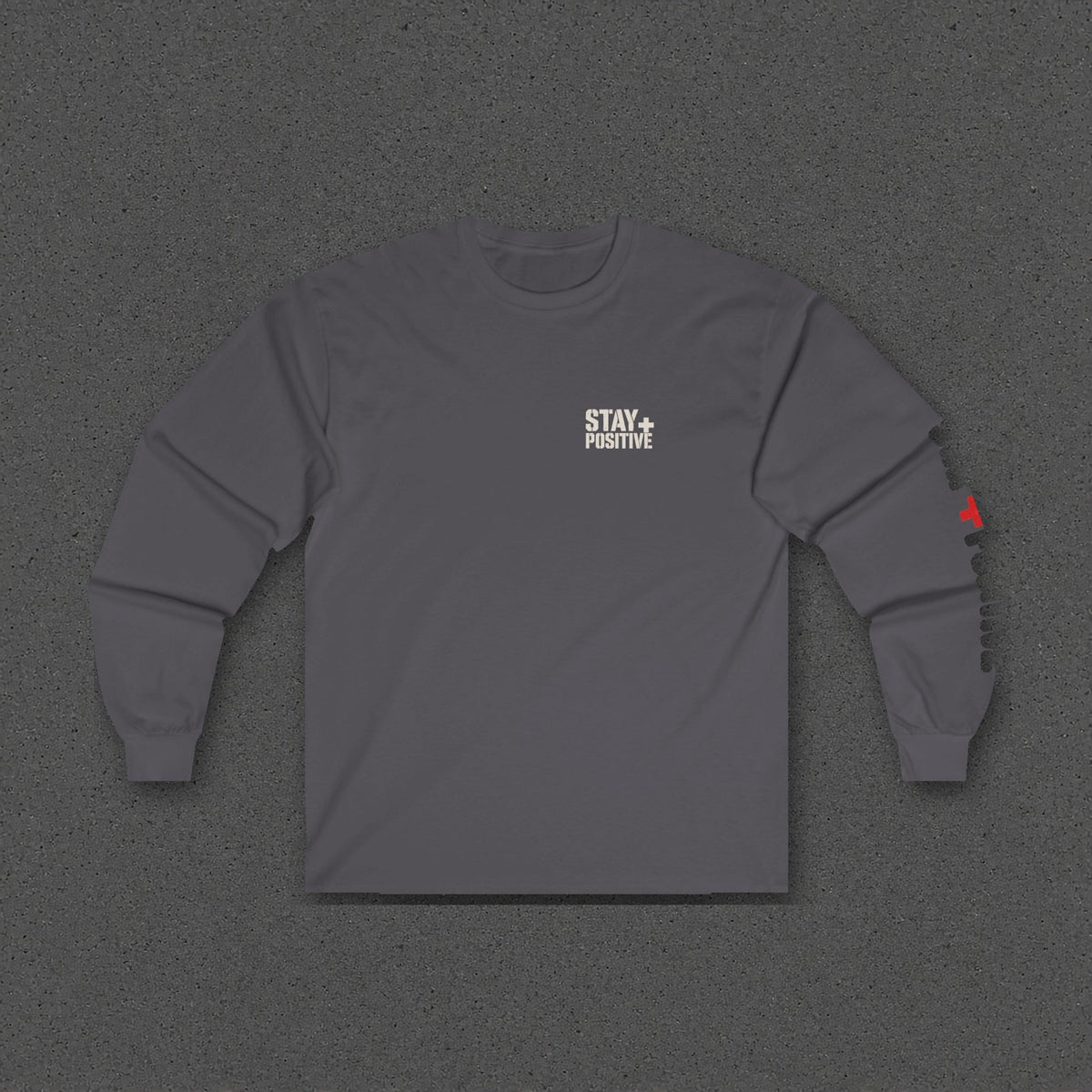 Comfort Never Built Nothin' Long Sleeve Tee – Stay Positive – Charcoal – front