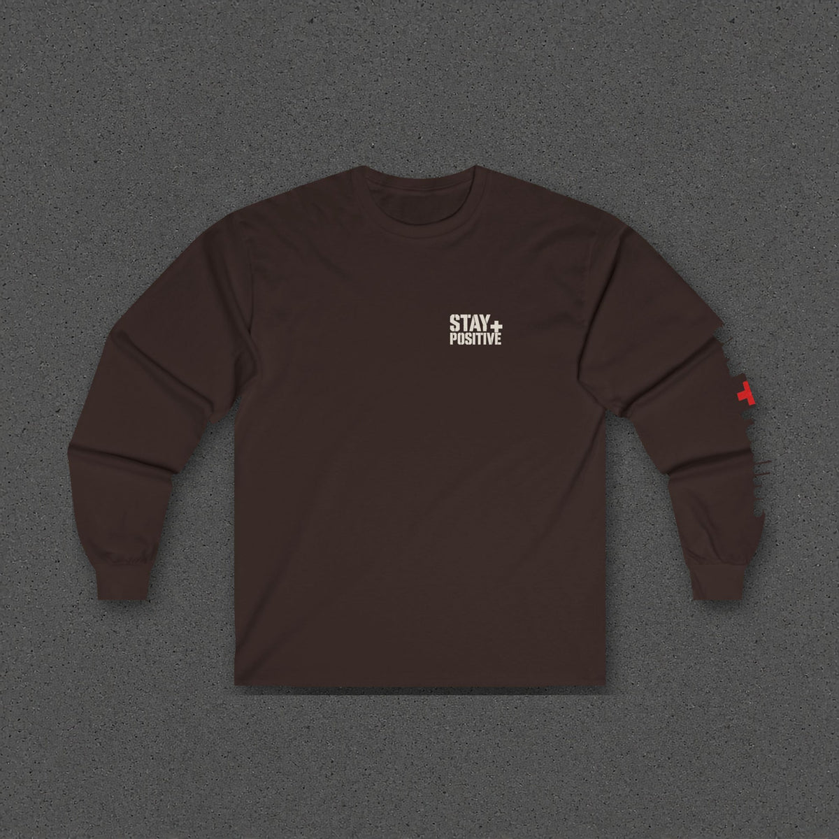Comfort Never Built Nothin' Long Sleeve Tee – Stay Positive – Dark Chocolate – front