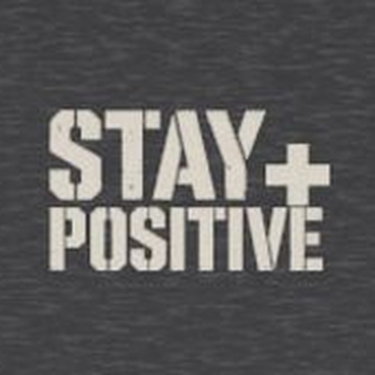 Comfort Never Built Nothin' Long Sleeve Tee – Stay Positive – Dark Heather – front print close-up