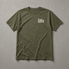 Military green t-shirt with small cream Stay Positive left-chest logo – Stay Positive by The Hillbillies, front view