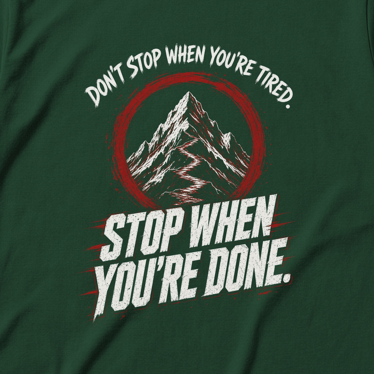 Don't Stop When You're Done Tee in Forest Green, close-up of the print – Stay Positive