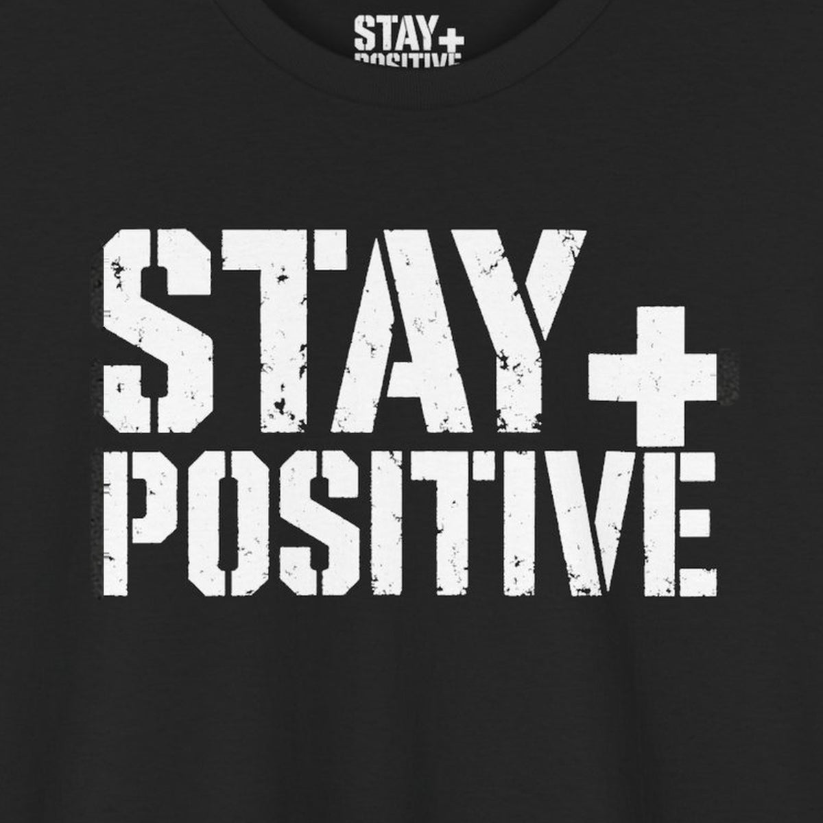 Stay Positive Logo Tee – Black – front print close-up