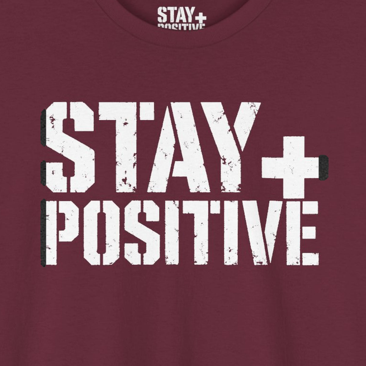 Stay Positive Logo Tee – Maroon – front print close-up
