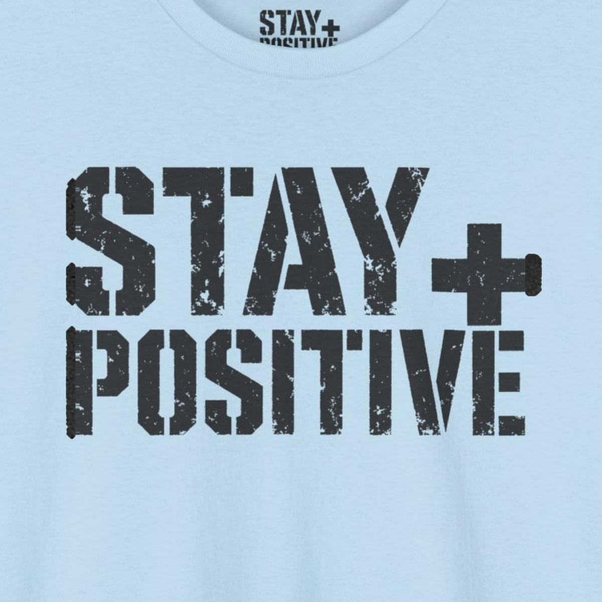 Stay Positive Logo Tee – Light Blue – front print close-up