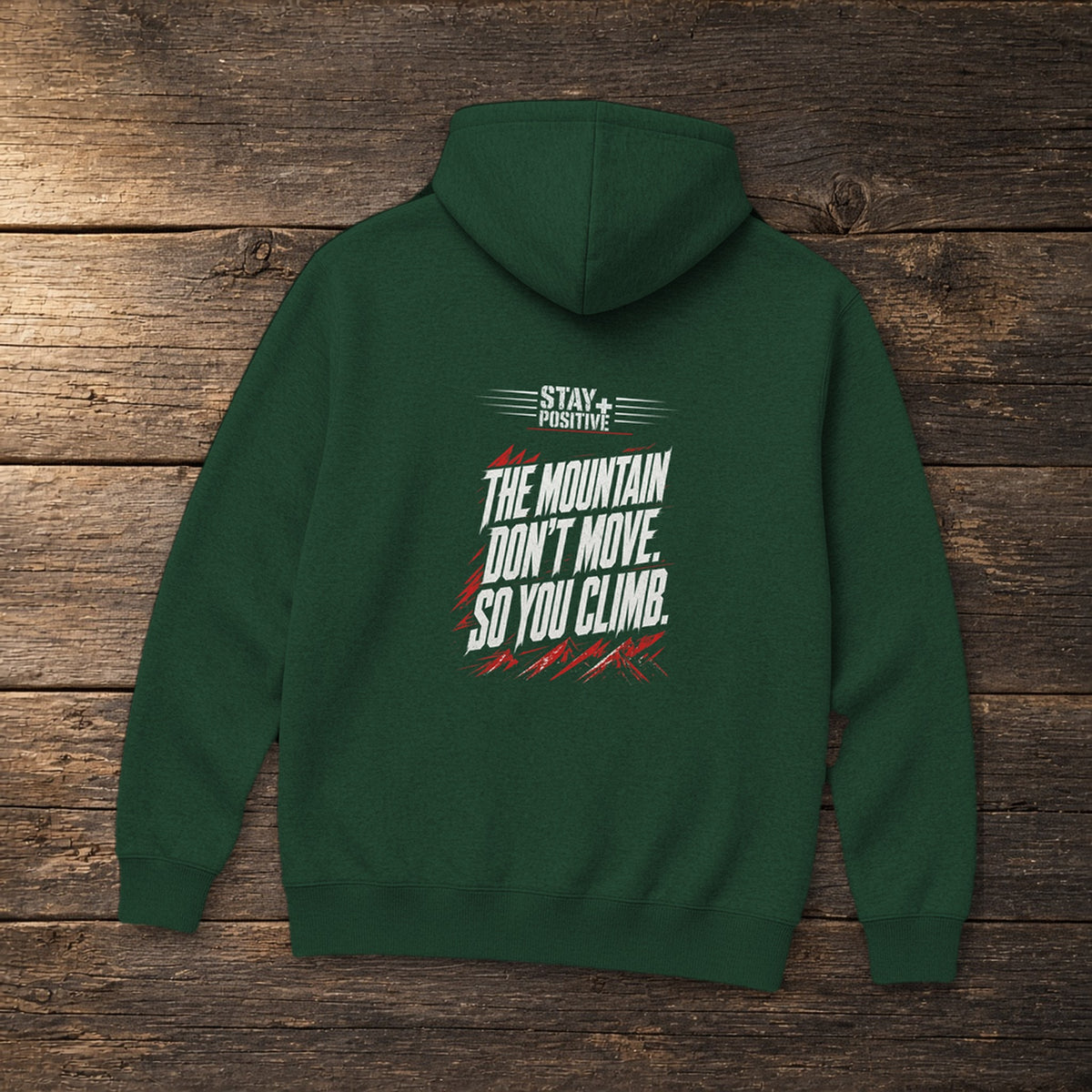 The Mountain Don't Move Hoodie in Forest Green, flat lay – Stay Positive