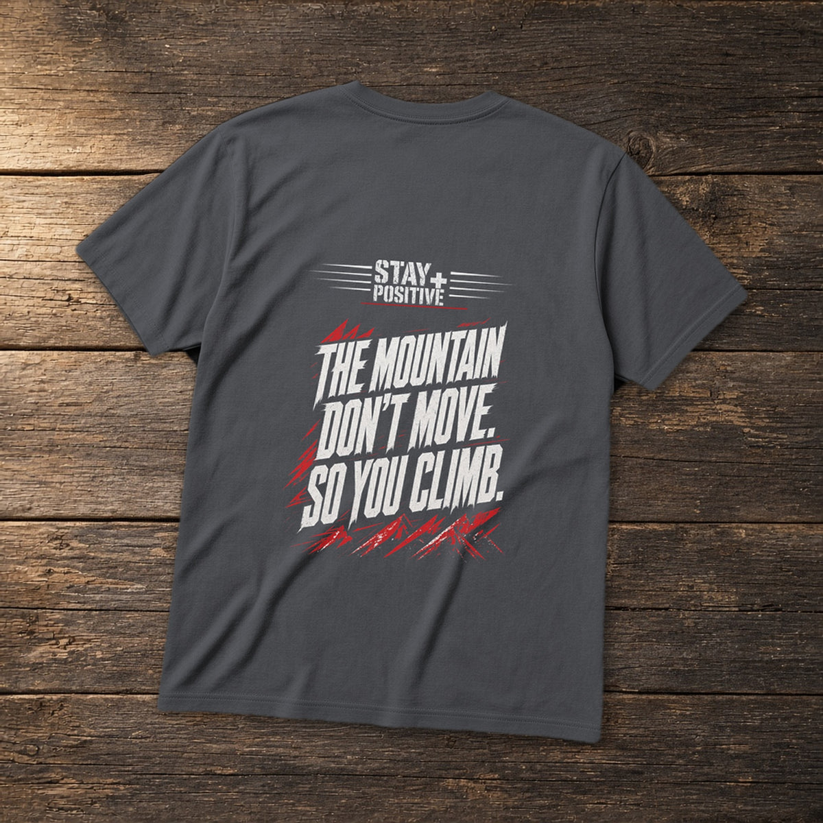 The Mountain Don't Move Tee in Charcoal, flat lay – Stay Positive