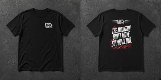 Black t-shirt with white Stay Positive chest logo and distressed white 'The Mountain Don't Move. So You Climb.' back print and red mountain slashes – Stay Positive by The Hillbillies, front and back view