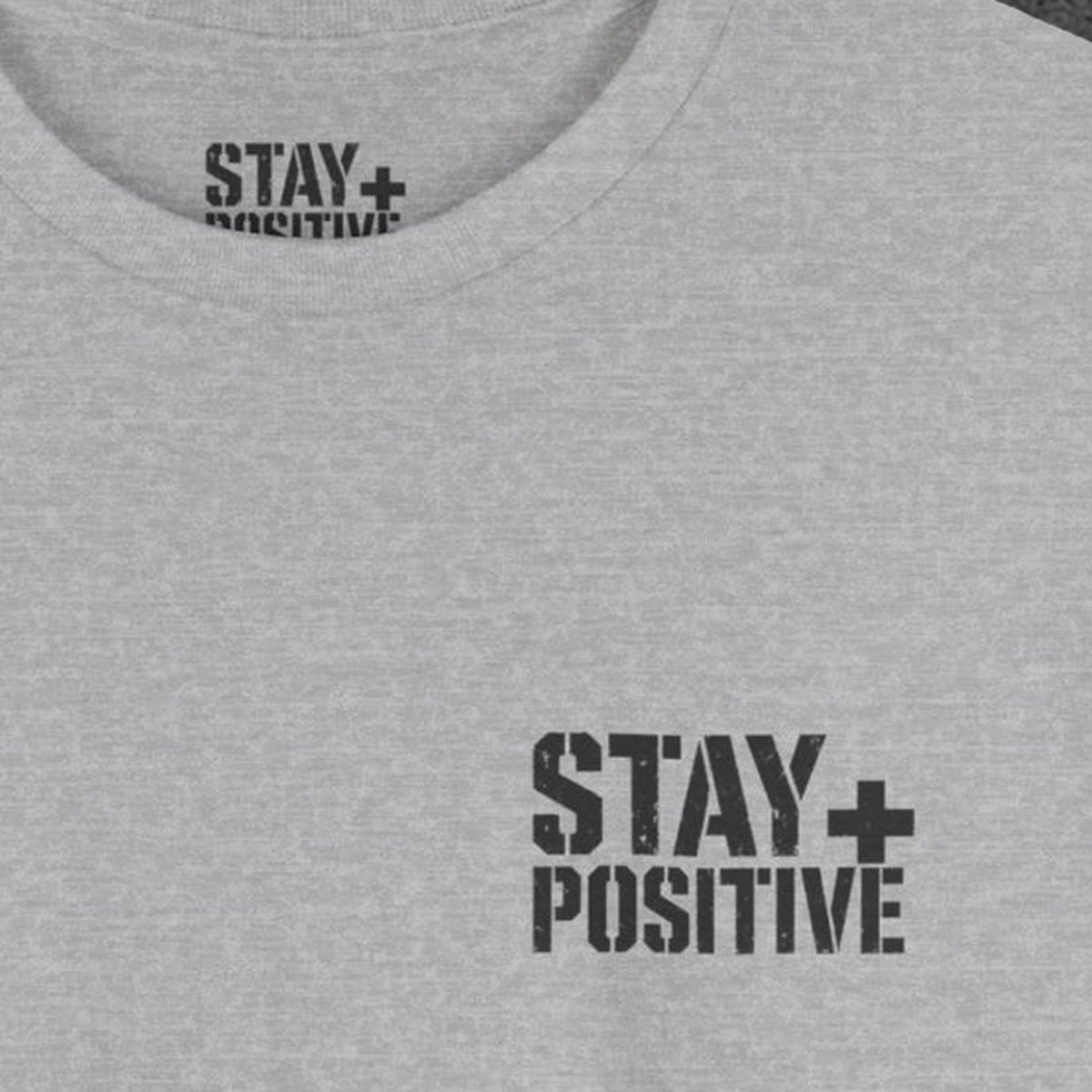 Quit Is Not in My Bloodline Tee – Stay Positive – Sport Grey – front print close-up