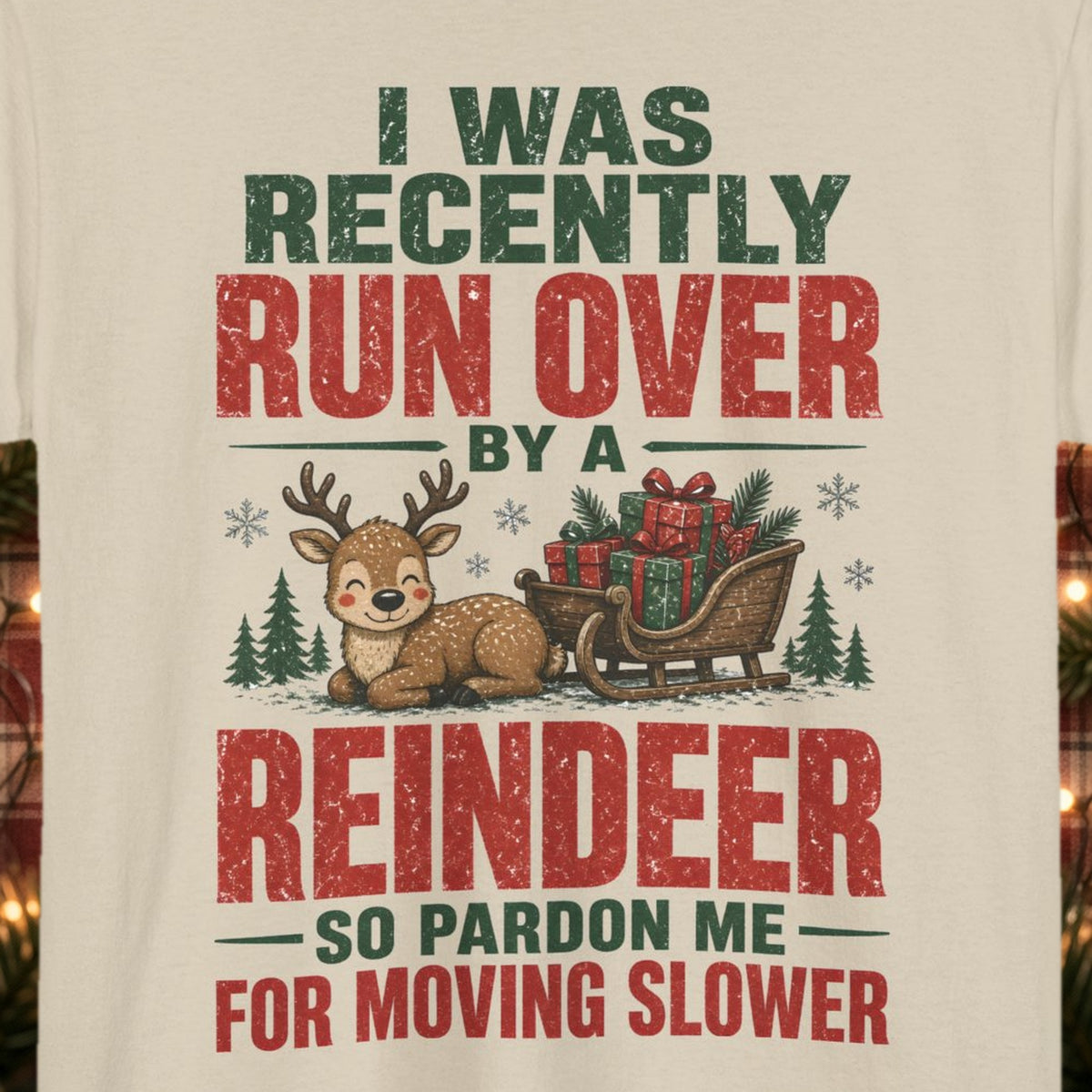 Run Over by a Reindeer Christmas Tee – Sand – front print close-up