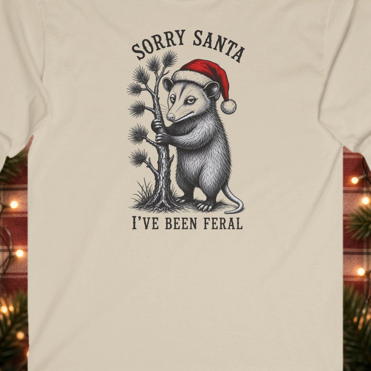 Sorry Santa, I've Been Feral Christmas Long Sleeve Tee – Sand – front print close-up