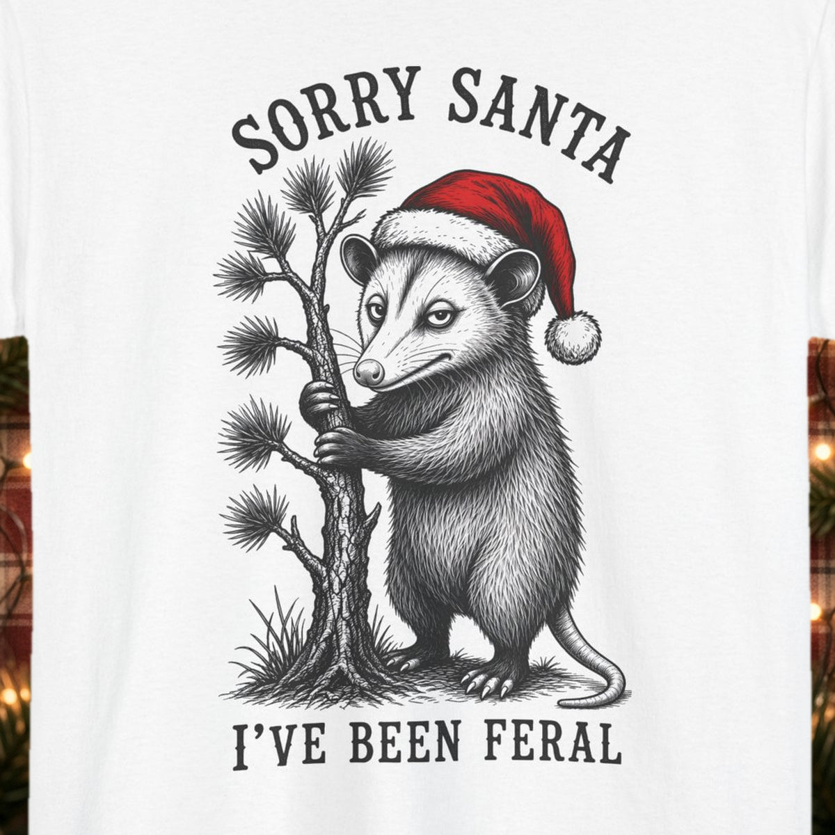 Sorry Santa, I've Been Feral Christmas Tee – White – front print close-up