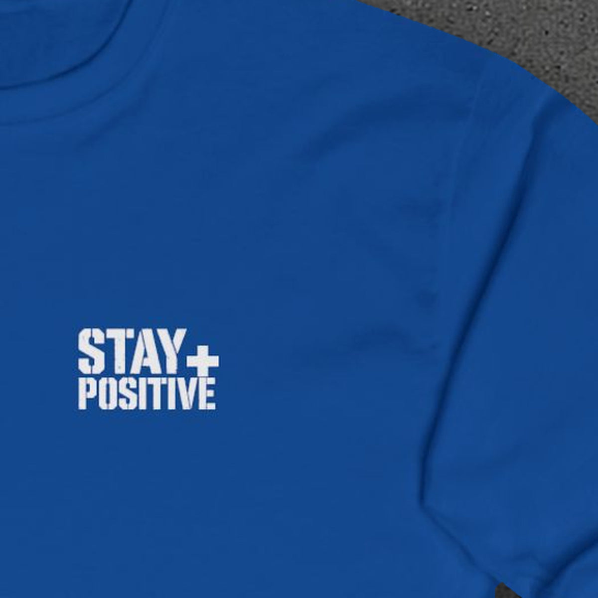 Tired Is a Feeling Long Sleeve Tee – Stay Positive – Royal – front print close-up